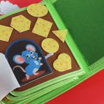 KIK KX2956 Montessori senzorická kniha farma, zelená