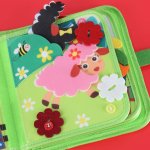 KIK KX2956 Montessori senzorická kniha farma, zelená