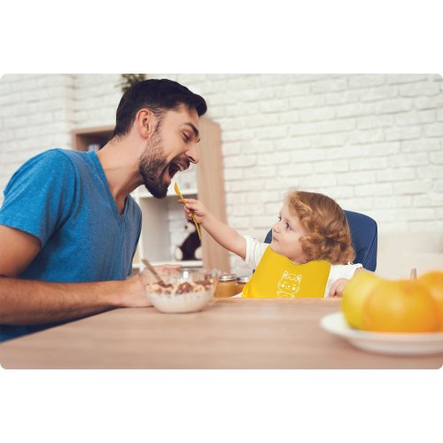 Ricokids 700390 Silikonový bryndák s kapsou, žlutý